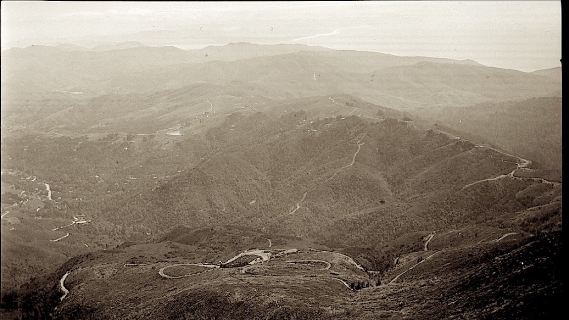The looping tracks of the Double Bow Knot far below, seen from the summit