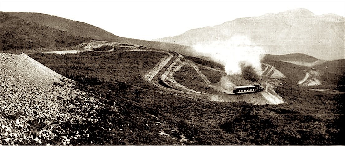 A train with a plume of steam on the looping curves of the Double Bow Knot, from Scientific American, 1898