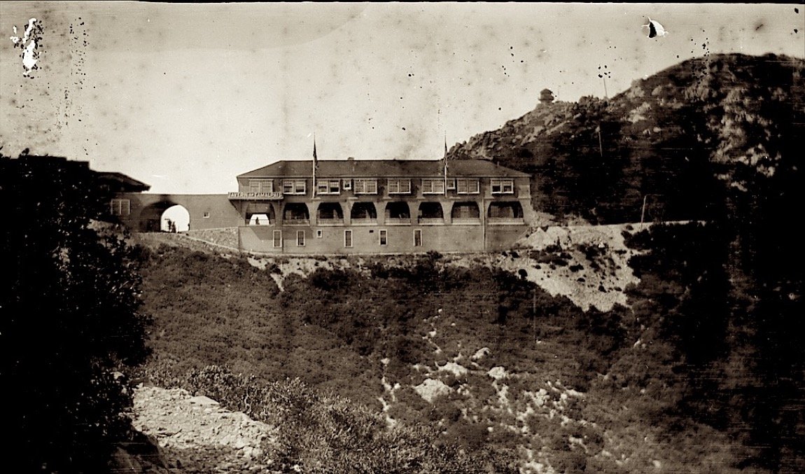 The long two-storey first Tavern on the ridge below the summit rocks